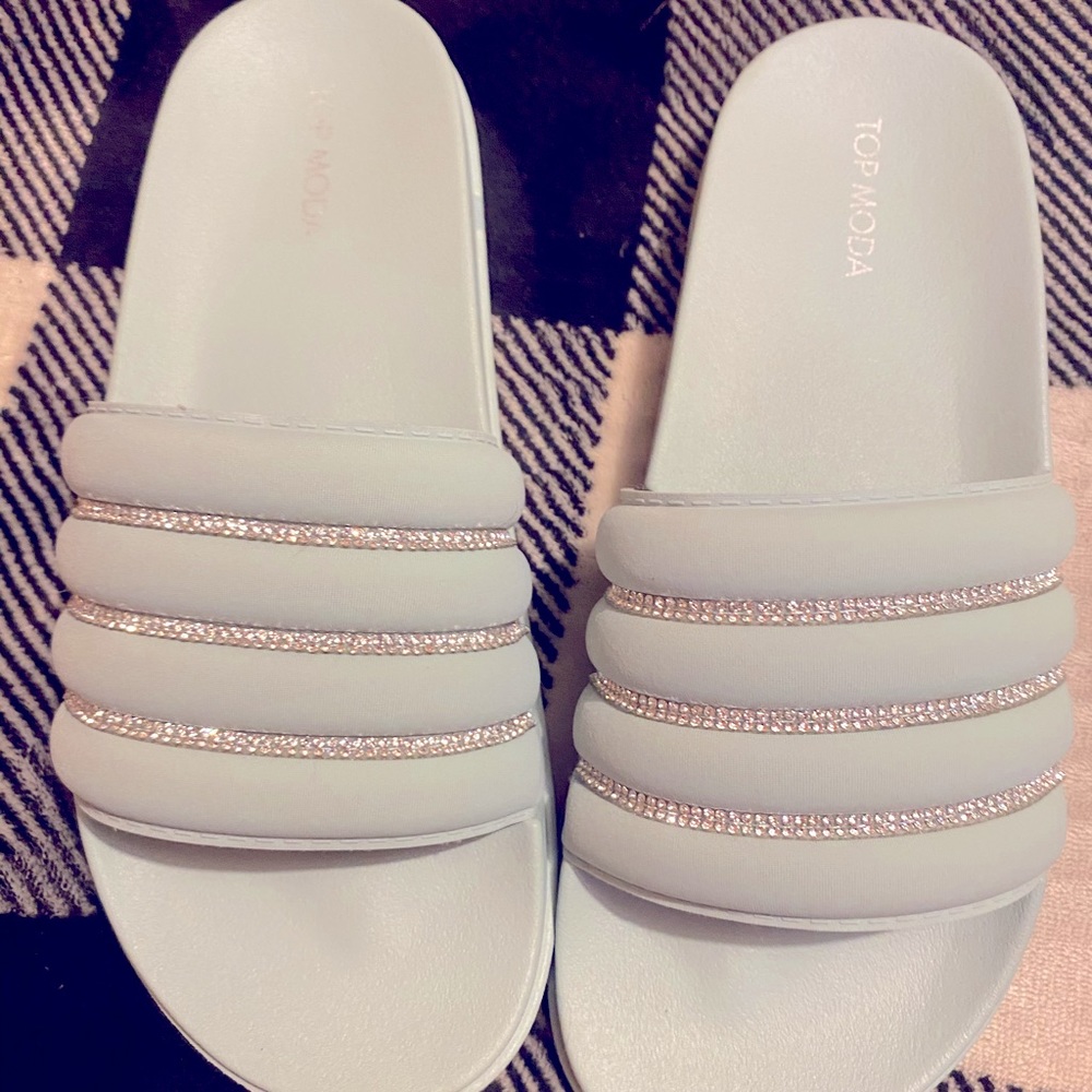 Slides , never worn.